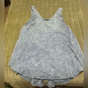 High low tank with low cut back and slit